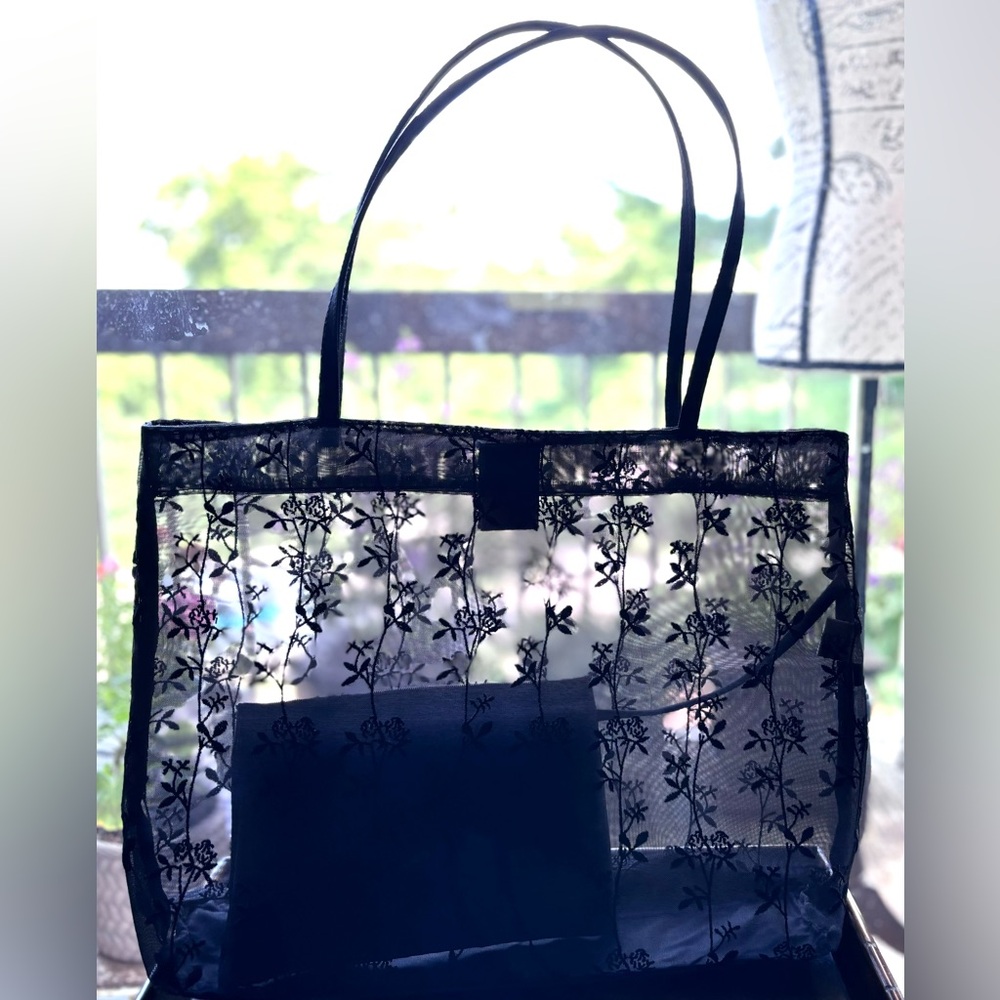 Large Mesh Tote with Embroidered Floral Accents, includes pouch
Like New